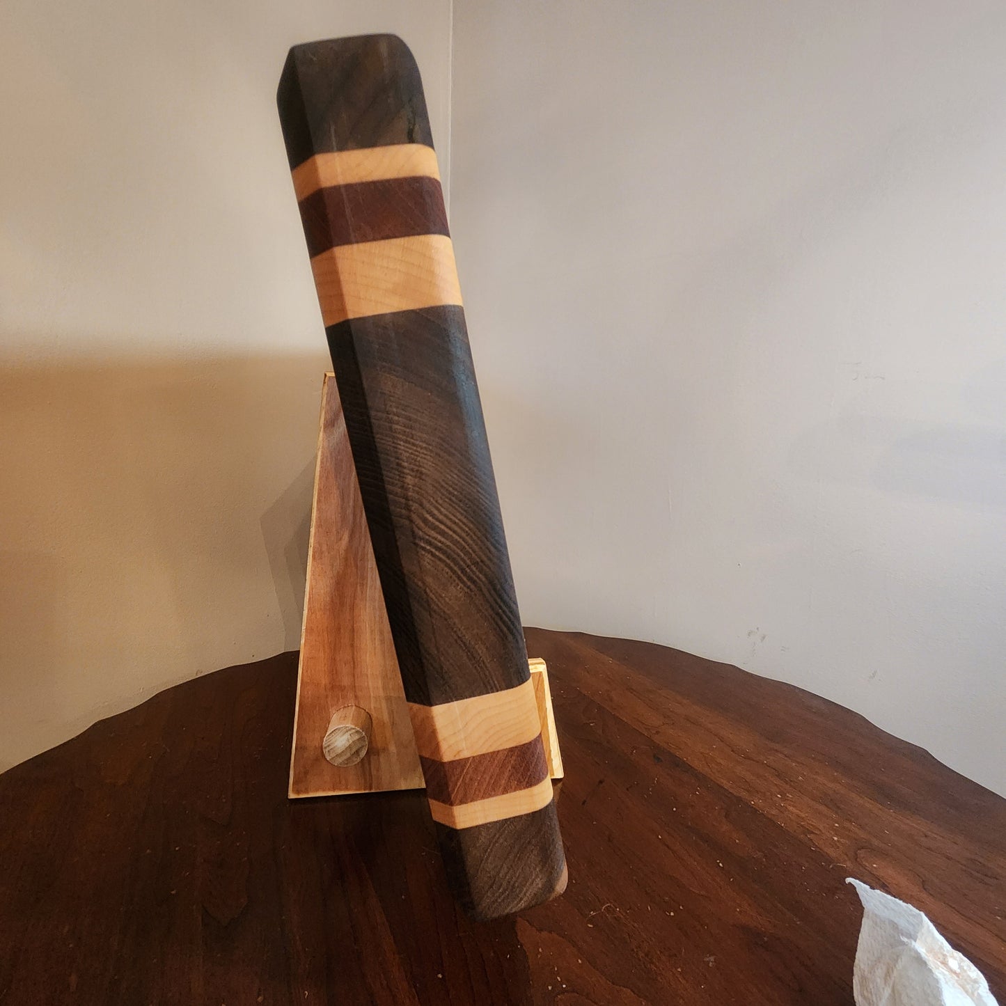 Walnut,maple,mahogany with walnut center. Food safe oil wax finish. 21.25"x11.25"x1.75"display stand sold separately
