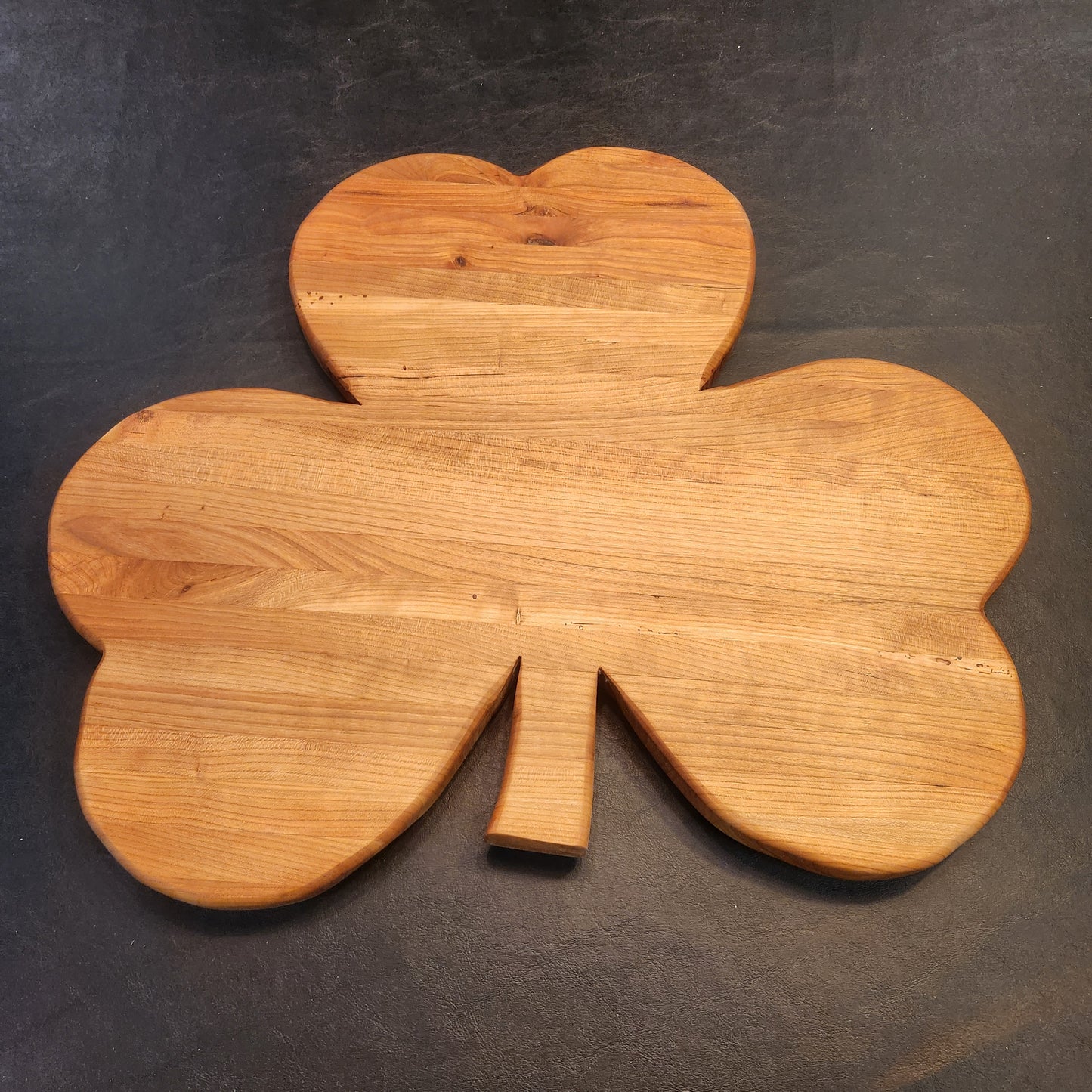 Large shamrock shaped charcuterie board, cutting board, serving tray. Built to order